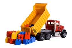 Dump truck toy downloading colorful blocks isolated on white