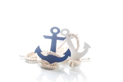 Wooden decorative anchor on the white background