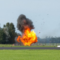 An explosion with flying debris