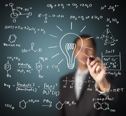smart teacher writing various high school chemistry formula with light bulb ( symbol of idea and solution )