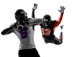 two american football players quarterback sacked in silhouette shadow on white background