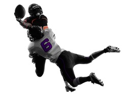 two american football players tackle in silhouette shadow on white background