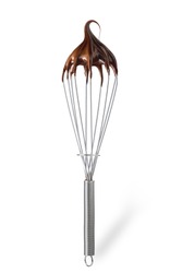 Whisk with melted chocolate cream isolated on white