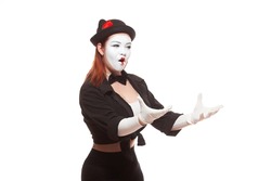 Portrait of a female mime artist performing, isolated on white background. Symbol of perturbation, indignation, question