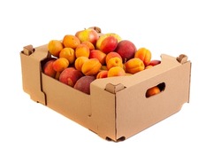 Fresh and tasty organic fruits in cardboard box, isolated on white