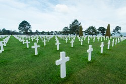 White marble cross on American Cemetery in Normandy,France