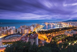 Malaga panoramic cityscape at evening at Costa del Sol in Andalucia,Spain
