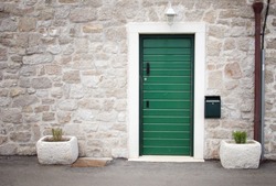 Green door in old stone house, Croatia