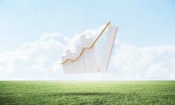 Growing financial graph on green meadow. Business statistics and analytics. Successful stock trading and investment. Beautiful landscape with cloudy blue sky. Mixed media with 3D rendering object.