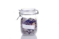 Glass jars with coins and empty space for text