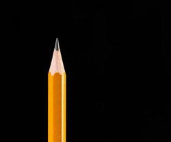 Pencil point on black background