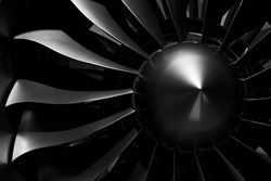 Modern turbofan engine. close up of turbojet of aircraft on black background. blades of the turbofan engine of the aircraft