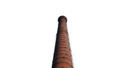 A large chimney in an old factory. smoke stack An old brick chimney on a white background