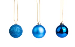 Three of blue christmas tree baubles  isolated on white background