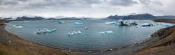 Jökulsárlón glacial lake, lagoon with ice blocks, Iceland. Situated near the edge of the Atlantic Ocean at the head of the Breiðamerkurjökull glacier, Vatnajökull icecap or Vatna Glacier.