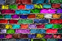 Rainbow colourful brick wall (background)