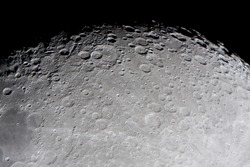 picture of the moon surface by telescope. This zone is called terminator, twilight zone or grey