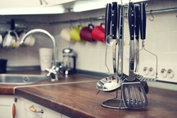 Kitchen utensils on  work top in modern kitchen