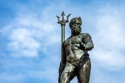 Closeup of the bronze statue of Neptune (1566), Roman God, fountain in Piazza del Nettuno, Bologna, Emilia-Romagna, Italy, Europe. Artist Giambologna (1529-1608)