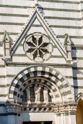 Close-up of the medieval Baptistery of San Giovanni in Corte or Ritondo (1303-1361) in Romanesque style, Piazza del Duomo (Cathedral square). Pistoia, Tuscany, Italy, Europe.