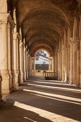Vicenza downtown, open gallery of the Basilica Palladiana by the Architect Andrea Palladio in Renaissance style (1549-1614), UNESCO world heritage site, Piazza dei Signori, Veneto, Italy, Europe.