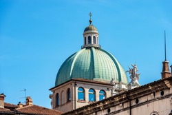 Close-up of the Cathedral of Santa Maria Assunta,1604-1825 in Brescia downtown, in late Baroque style, also called Duomo nuovo. Cathedral square or Paolo VI square. Lombardy, Italy, Europe.