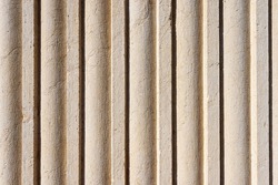 Extreme close-up of a striped Roman marble column, full frame, background, photography. Brescia, Lombardy, Italy, Europe.
