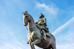 Bronze statue of King Philip III on Horseback (Felipe III or Felipe el Piadoso), by Giambologna and Pietro Tacca in Plaza Mayor (main square), Madrid downtown, Spain, southern Europe.
