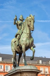 Closeup of the bronze statue of King Philip III on Horseback (Felipe III or Felipe el Piadoso), in Plaza Mayor (main square), Madrid downtown, community of Madrid, Spain, southern Europe.