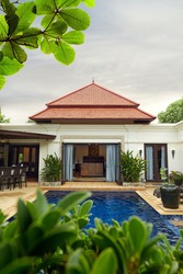 view of nice bali style  villa  in tropic environment   