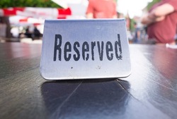a reservation or reserved sign in a pub or restaurant