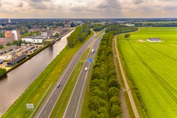 A7 Highway in between a canal and the countryside near Hoogezand Sappemeer, Groningen Province, the Netherlands.