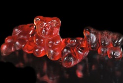 Group of sticky red gummy bears