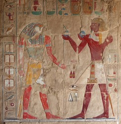 colored stone relief at Deir el-Bahri in Egypt