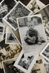remembering childhood: stack of old photos