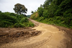 Waterlogged Dirt Road Leading Through Chin State Mountainous Region, Myanmar (Burma)