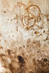 Grungy background of old stained paper with coffee cup stains