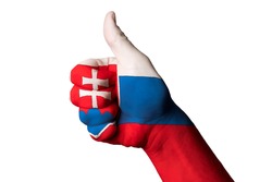 Hand with thumb up gesture in colored slovakia national flag as symbol of excellence, achievement, good, - useful for tourism and touristic advertising