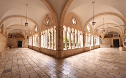 The decorative columns and arches of the corridors of the 13th Century Franciscan Monastery in Dubrovnik, Croatia