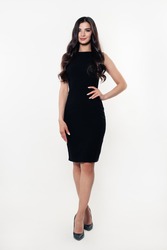 Fashion Model Woman in Black Dress. Beautiful Young Woman