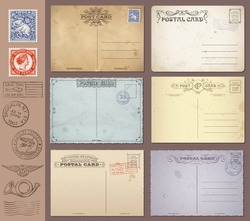 A set of high detail grunge Vintage Postcards and Stamps. Vector file is EPS v.10. Transparency effects are present. Vector file is organized with layers.