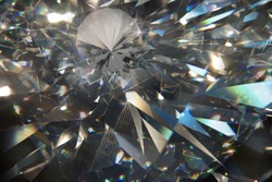 layered triangular macro diamond shapes with a small diamond over them     