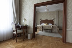 table chair and king size bed in a luxury apartment interior