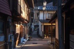 small village alleys with light shade in the morning at Yamanouchi city, Nagano, Japan. Here is famous of having hot spring onsen service.