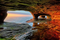 Beautiful sea cave sunset on Lake Superior near Munising, Michigan and Pictured Rocks National Lakeshore.