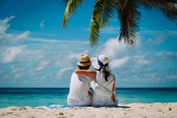 happy loving couple on tropical beach