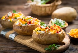 Baked potatoes with cheese and bacon