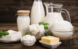 Fresh dairy products on the wooden table 