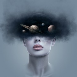 Fantasy art portrait of young woman with head in galaxy outer space. Concept of dreams or imagination