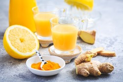 Close up of healthy Ginger Lemon Turmeric Shot ? ideal to boost the immune system